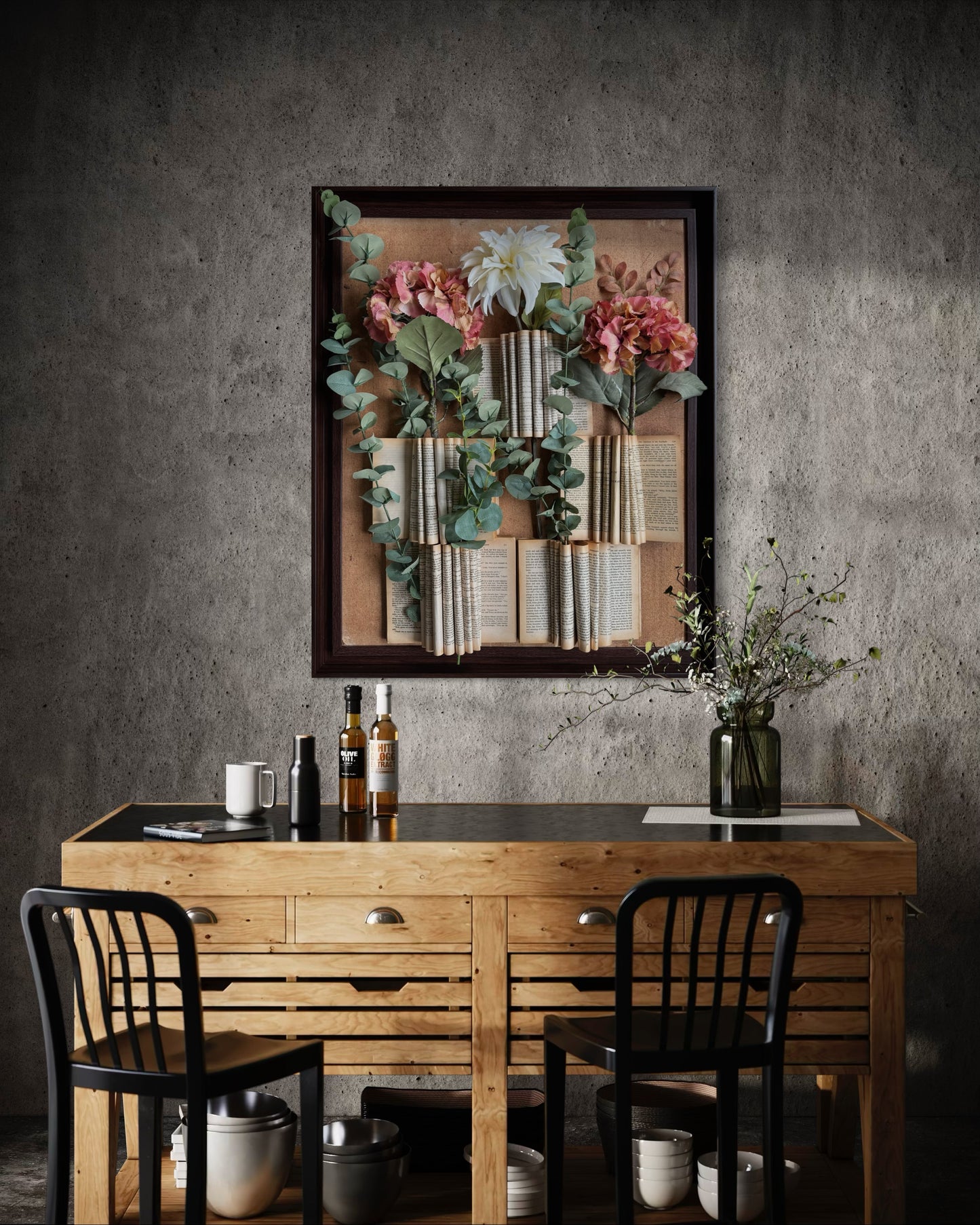 Decorative floral frame with rolled book paper, eucalyptus stems, and pink and white fabric flowers