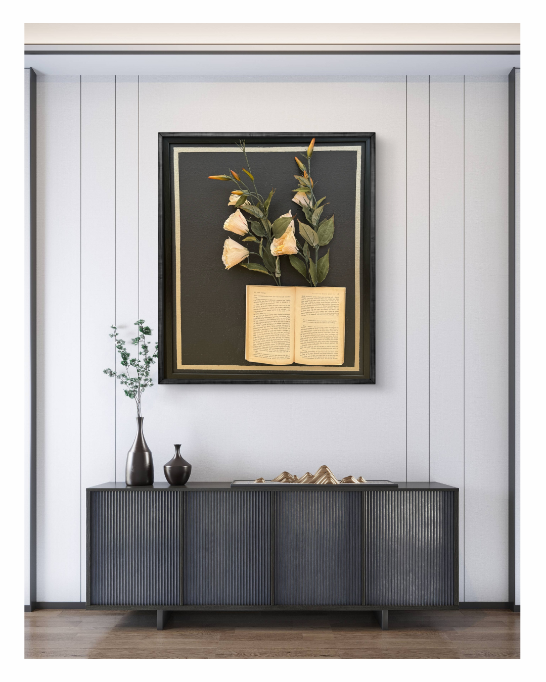 Mixed media artwork with floral elements emerging from torn book paper in neutral tones.