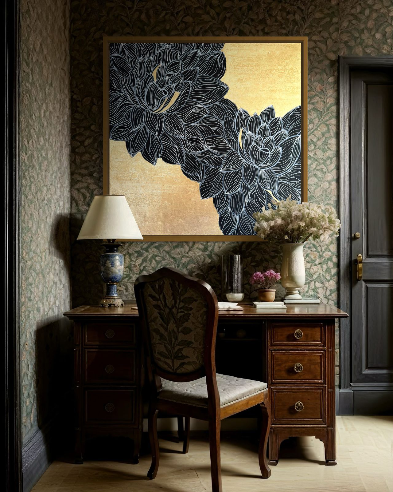 A luxurious gold and blue living room featuring a stunning gold chandelier and elegant lotus-inspired artwork.