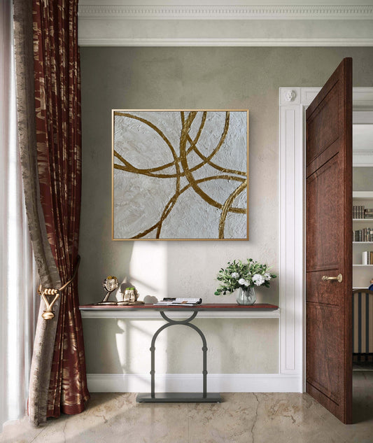 Large contemporary textured wall art perfectly proportioned above a sofa in a modern living room interior.