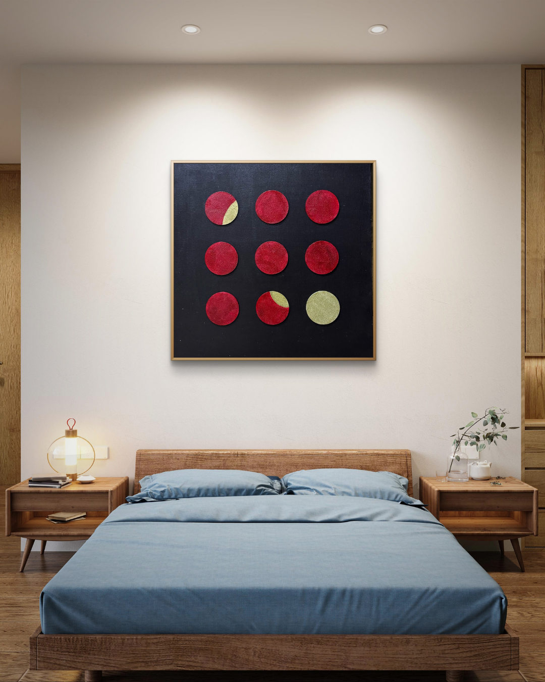 Contemporary red and gold circular art on black canvas, with one full gold and two partially gold circles in a 3x3 layout