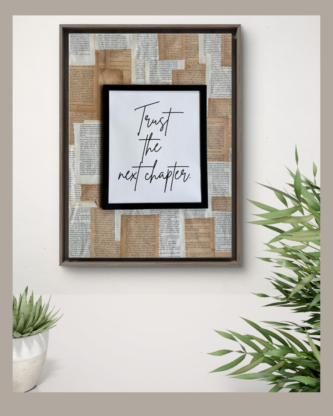 Decorative wall art combining vintage paper textures and the phrase “Trust the next chapter.”