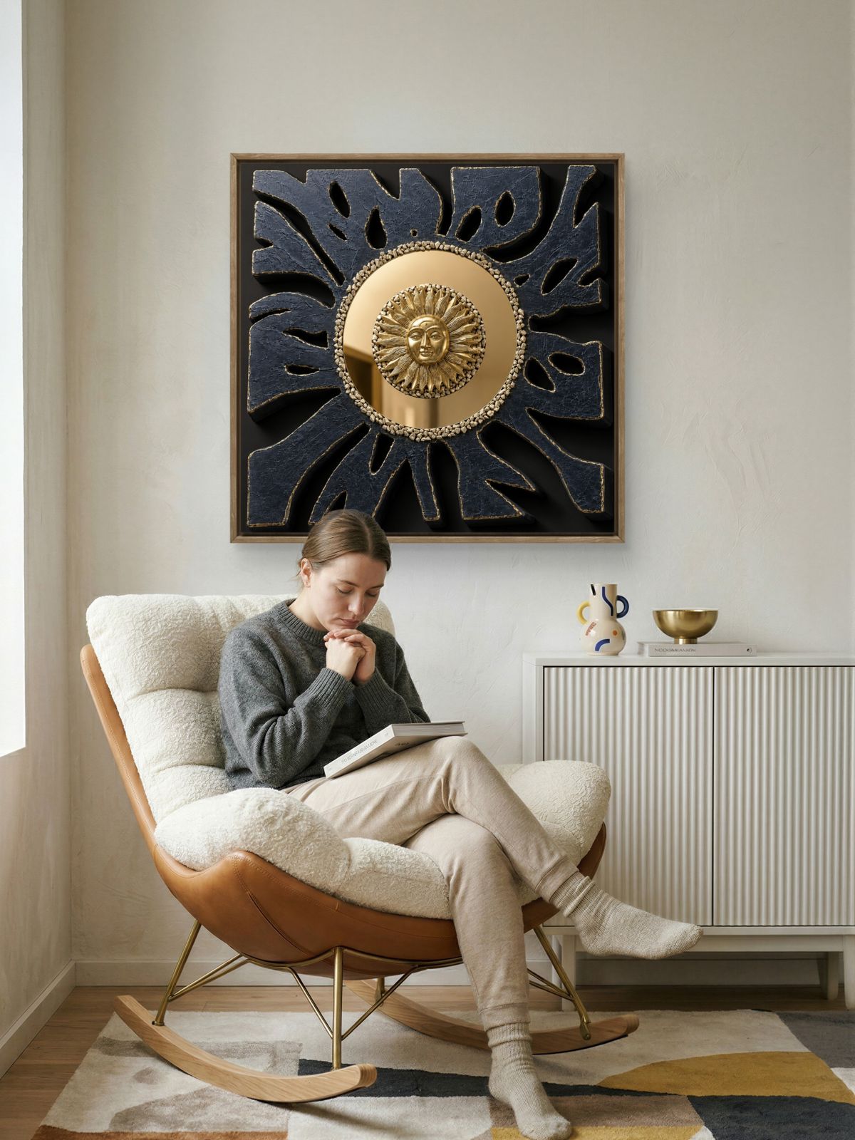 Contemporary textured wall artwork featuring a radiant gold acrylic mirror sun at the center, surrounded by sculptural black rays with gold accents. Symbolizing inner strength, clarity, and resilience, this handcrafted statement piece adds depth and elegance to modern living rooms, offices, and luxury interiors.