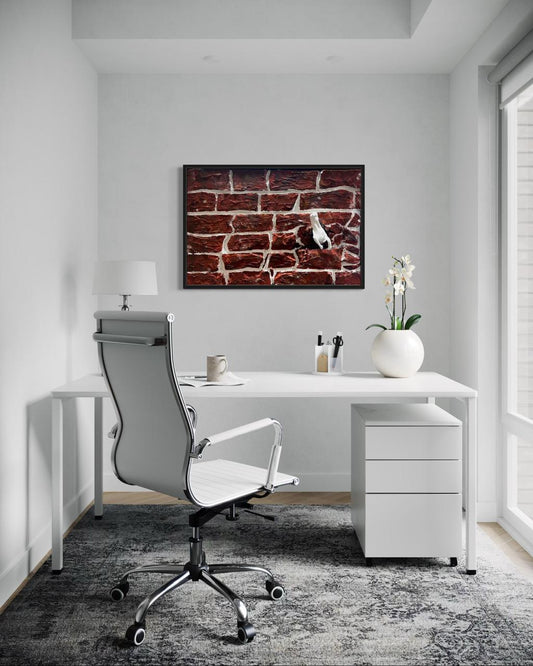 Textured wall art of a horse breaking through a brick wall symbolising movement and momentum.