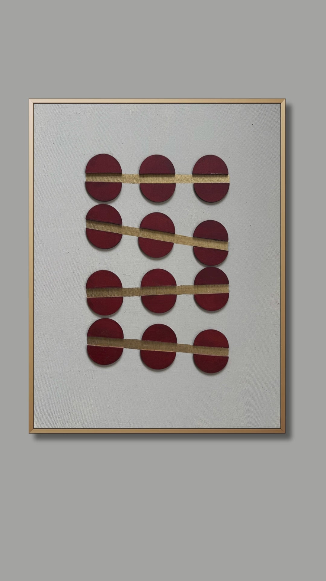 Minimal abstract artwork featuring bold crimson oval shapes bound by thin golden lines on a soft white textured background, symbolizing resilience and emotional balance.
